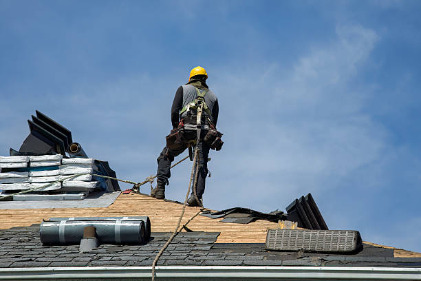 Professional Roof Replacement technician working in Hopedale, IL